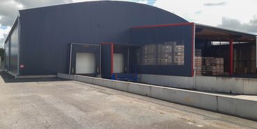 Extension bâtiment de stockage avec quais de chargement