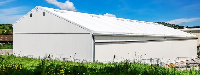 Un bâtiment pour veiller sur la poudre de lait